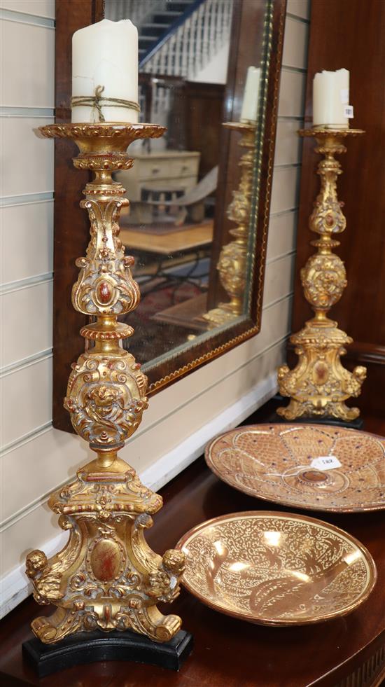 A pair of Renaissance style gilt pricket candlesticks